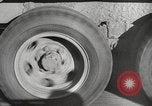 Image of tire remover United States USA, 1947, second 30 stock footage video 65675066620