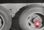 Image of tire remover United States USA, 1947, second 31 stock footage video 65675066620
