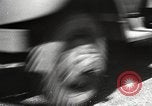 Image of tire remover United States USA, 1947, second 33 stock footage video 65675066620