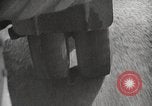 Image of tire remover United States USA, 1947, second 40 stock footage video 65675066620