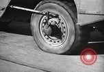 Image of tire remover United States USA, 1947, second 43 stock footage video 65675066620