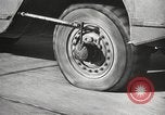 Image of tire remover United States USA, 1947, second 45 stock footage video 65675066620