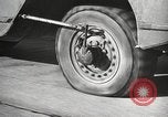 Image of tire remover United States USA, 1947, second 46 stock footage video 65675066620
