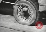 Image of tire remover United States USA, 1947, second 49 stock footage video 65675066620