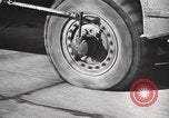 Image of tire remover United States USA, 1947, second 50 stock footage video 65675066620
