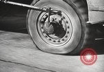 Image of tire remover United States USA, 1947, second 51 stock footage video 65675066620
