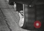Image of tire remover United States USA, 1947, second 54 stock footage video 65675066620