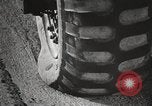 Image of tire remover United States USA, 1947, second 55 stock footage video 65675066620