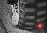 Image of tire remover United States USA, 1947, second 56 stock footage video 65675066620
