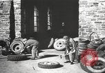 Image of tire remover United States USA, 1947, second 57 stock footage video 65675066620