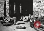Image of tire remover United States USA, 1947, second 59 stock footage video 65675066620
