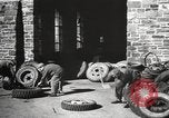 Image of tire remover United States USA, 1947, second 60 stock footage video 65675066620