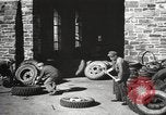 Image of tire remover United States USA, 1947, second 61 stock footage video 65675066620