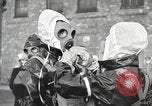 Image of gas masks United Kingdom, 1939, second 54 stock footage video 65675066624