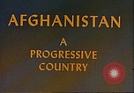 Image of Camel caravan silhouetted against the sky at dawn Afghanistan, 1960, second 12 stock footage video 65675066733