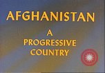 Image of Camel caravan silhouetted against the sky at dawn Afghanistan, 1960, second 13 stock footage video 65675066733