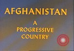 Image of Camel caravan silhouetted against the sky at dawn Afghanistan, 1960, second 14 stock footage video 65675066733