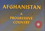 Image of Camel caravan silhouetted against the sky at dawn Afghanistan, 1960, second 16 stock footage video 65675066733