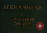 Image of Camel caravan silhouetted against the sky at dawn Afghanistan, 1960, second 19 stock footage video 65675066733