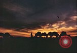 Image of Camel caravan silhouetted against the sky at dawn Afghanistan, 1960, second 29 stock footage video 65675066733