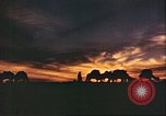 Image of Camel caravan silhouetted against the sky at dawn Afghanistan, 1960, second 30 stock footage video 65675066733