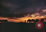 Image of Camel caravan silhouetted against the sky at dawn Afghanistan, 1960, second 31 stock footage video 65675066733