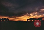 Image of Camel caravan silhouetted against the sky at dawn Afghanistan, 1960, second 32 stock footage video 65675066733