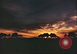 Image of Camel caravan silhouetted against the sky at dawn Afghanistan, 1960, second 39 stock footage video 65675066733