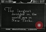 Image of Brooklyn Bridge and Williamsburg Bridge New York City USA, 1918, second 13 stock footage video 65675066758