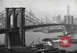 Image of Brooklyn Bridge and Williamsburg Bridge New York City USA, 1918, second 15 stock footage video 65675066758