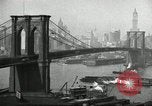 Image of Brooklyn Bridge and Williamsburg Bridge New York City USA, 1918, second 16 stock footage video 65675066758