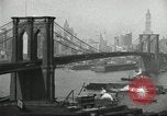 Image of Brooklyn Bridge and Williamsburg Bridge New York City USA, 1918, second 17 stock footage video 65675066758
