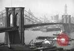 Image of Brooklyn Bridge and Williamsburg Bridge New York City USA, 1918, second 18 stock footage video 65675066758