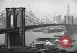 Image of Brooklyn Bridge and Williamsburg Bridge New York City USA, 1918, second 19 stock footage video 65675066758