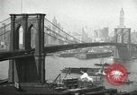 Image of Brooklyn Bridge and Williamsburg Bridge New York City USA, 1918, second 20 stock footage video 65675066758