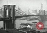 Image of Brooklyn Bridge and Williamsburg Bridge New York City USA, 1918, second 21 stock footage video 65675066758