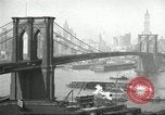 Image of Brooklyn Bridge and Williamsburg Bridge New York City USA, 1918, second 22 stock footage video 65675066758