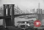 Image of Brooklyn Bridge and Williamsburg Bridge New York City USA, 1918, second 23 stock footage video 65675066758