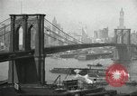 Image of Brooklyn Bridge and Williamsburg Bridge New York City USA, 1918, second 24 stock footage video 65675066758