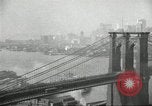 Image of Brooklyn Bridge and Williamsburg Bridge New York City USA, 1918, second 28 stock footage video 65675066758