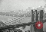 Image of Brooklyn Bridge and Williamsburg Bridge New York City USA, 1918, second 29 stock footage video 65675066758