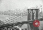 Image of Brooklyn Bridge and Williamsburg Bridge New York City USA, 1918, second 30 stock footage video 65675066758