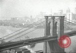 Image of Brooklyn Bridge and Williamsburg Bridge New York City USA, 1918, second 31 stock footage video 65675066758