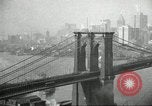 Image of Brooklyn Bridge and Williamsburg Bridge New York City USA, 1918, second 33 stock footage video 65675066758