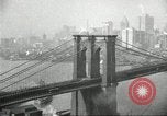Image of Brooklyn Bridge and Williamsburg Bridge New York City USA, 1918, second 34 stock footage video 65675066758