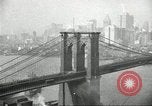 Image of Brooklyn Bridge and Williamsburg Bridge New York City USA, 1918, second 35 stock footage video 65675066758