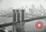 Image of Brooklyn Bridge and Williamsburg Bridge New York City USA, 1918, second 38 stock footage video 65675066758
