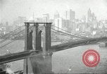 Image of Brooklyn Bridge and Williamsburg Bridge New York City USA, 1918, second 39 stock footage video 65675066758