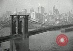 Image of Brooklyn Bridge and Williamsburg Bridge New York City USA, 1918, second 41 stock footage video 65675066758