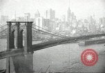 Image of Brooklyn Bridge and Williamsburg Bridge New York City USA, 1918, second 43 stock footage video 65675066758